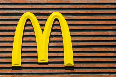 BUCHAREST, ROMANIA - JUNE 14: McDonald Sign on June 14, 2013 in Bucharest, Romania. McDonald Corporation is the world largest food chain.のeditorial素材