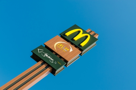 BUCHAREST, ROMANIA - JULY 6: McDonalds Sign on July 6, 2013 in Bucharest, Romania. McDonalds Corporation is the worlds largest chain of fast food restaurants.のeditorial素材