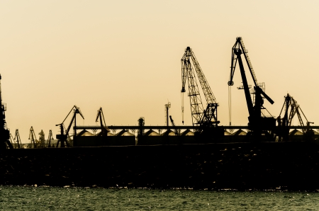 Sea Port Silhouette On Sunsetの写真素材