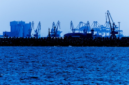 Port Cranes Silhouettes On Nightの写真素材