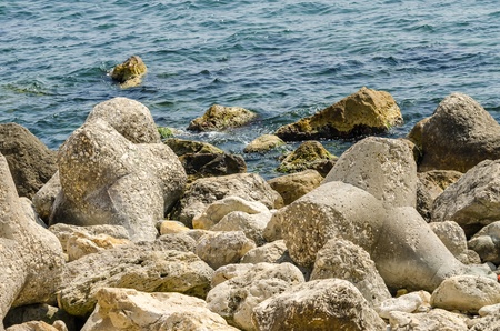 Black Sea Waves Crash Against Constanta Shore Rocksの写真素材
