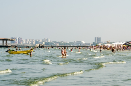 MAMAIA, ROMANIA - AUGUST 08  People have fun at the Black Sea on August 08, 2013 in Mamaia, Romania  Mamaia is considered to be the most popular romanian resort with 4 and 5 stars hotels のeditorial素材