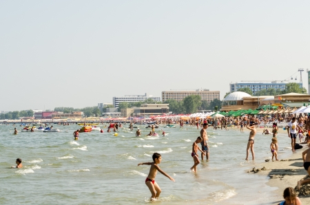 MAMAIA, ROMANIA - AUGUST 08  People have fun at the Black Sea on August 08, 2013 in Mamaia, Romania  Mamaia is considered to be the most popular romanian resort with 4 and 5 stars hotels のeditorial素材