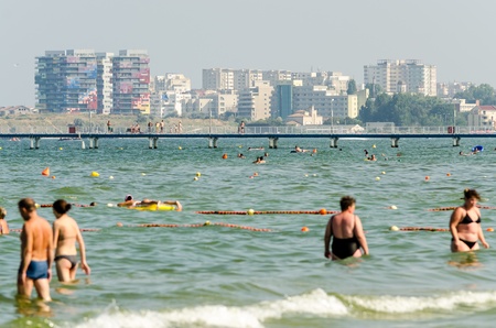 MAMAIA, ROMANIA - AUGUST 08  People have fun at the Black Sea on August 08, 2013 in Mamaia, Romania  Mamaia is considered to be the most popular romanian resort with 4 and 5 stars hotels のeditorial素材