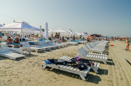 MAMAIA, ROMANIA - AUGUST 08  People have fun at the Black Sea on August 08, 2013 in Mamaia, Romania  Mamaia is considered to be the most popular romanian resort with 4 and 5 stars hotels のeditorial素材