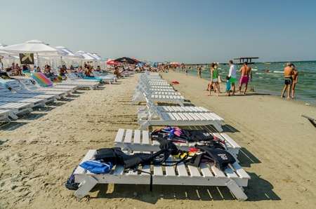 MAMAIA, ROMANIA - AUGUST 08  People have fun at the Black Sea on August 08, 2013 in Mamaia, Romania  Mamaia is considered to be the most popular romanian resort with 4 and 5 stars hotels のeditorial素材