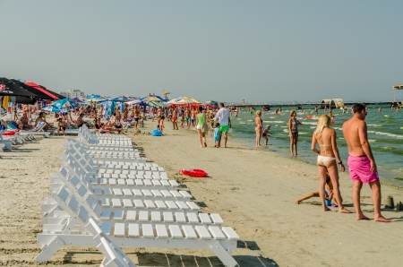 MAMAIA, ROMANIA - AUGUST 08  People have fun at the Black Sea on August 08, 2013 in Mamaia, Romania  Mamaia is considered to be the most popular romanian resort with 4 and 5 stars hotels のeditorial素材