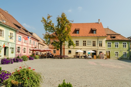 SIGHISOARA, ROMANIA - AUGUST 23  The Fortress Square on August 23, 2013 in Sighisoara, Romania  Sighisoara is considered the most beautiful and well preserved inhabited citadel in Europe のeditorial素材