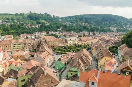 SIGHISOARA, ROMANIA - AUGUST 23  Sighisoara Medieval Fortress Aerial View on August 23, 2013 in Sighisoara, Romania  Founded in 1191, today is the most well preserved inhabited citadel in Europe のeditorial素材