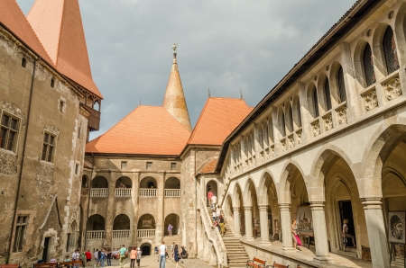 HUNEDOARA, ROMANIA - AUGUST 25  Corvin Castle on August 25, 2013 in Hunedoara, Romania  It is a Gothic castle built in 1446, has tall and strong defence towers, an interior yard and a drawbridge のeditorial素材