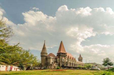 HUNEDOARA, ROMANIA - AUGUST 25  Corvin Castle on August 25, 2013 in Hunedoara, Romania  It is a Gothic castle built in 1446, has tall and strong defence towers, an interior yard and a drawbridge のeditorial素材