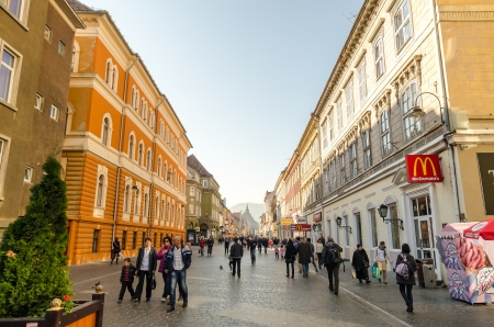 BRASOV, ROMANIA - NOVEMBER 02  Main Street on November 02, 2013 in Brasov, Romania  It has been the place for annual markets since 1364 being visited by merchants from the country and abroad のeditorial素材