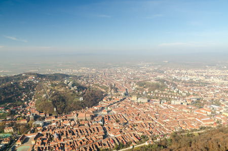Aerial View Of Brasov City In The Carpathian Mountains Of Romaniaの写真素材