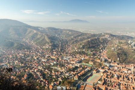 Aerial View Of Brasov City In The Carpathian Mountains Of Romaniaの写真素材