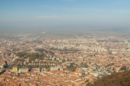 Aerial View Of Brasov City In The Carpathian Mountains Of Romaniaの写真素材