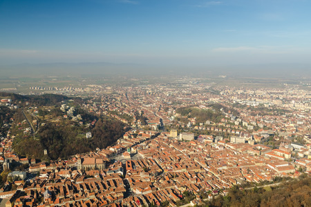Aerial View Of Brasov City In The Carpathian Mountains Of Romaniaの写真素材
