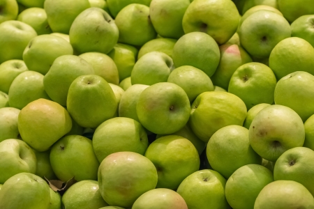 Green Apples In Market Displayの写真素材