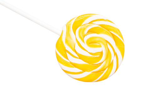 Sweet Yellow Spiral Lollipop On White Backgroundの写真素材