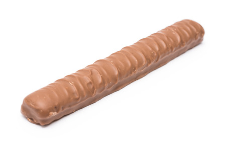 Long Milk Chocolate Bar With Caramel Filling On White Backgroundの写真素材