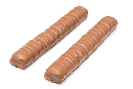 Long Milk Chocolate Bars With Caramel Filling On White Backgroundの写真素材