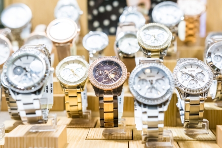 BUCHAREST, ROMANIA - DECEMBER 29, 2013  Fossil Watches In Shop Window Display  Founded in 1984 it is an American designer and manufacturer of clothing and accessories, primarily watches and jewelry のeditorial素材