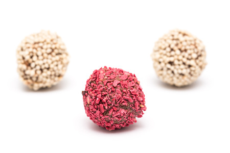 Raspberry And White Chocolate Candies Isolated On White Backgroundの写真素材
