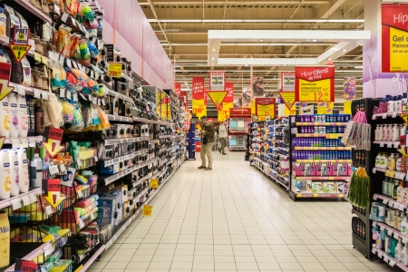 BUCHAREST, ROMANIA - JANUARY 22, 2014  People Shopping In Supermarket  The supermarket is a self-service shop offering a wide variety of food and household products, organized into aisles のeditorial素材