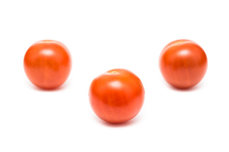 Red Cherry Tomatoes Isolated On Whiteの写真素材