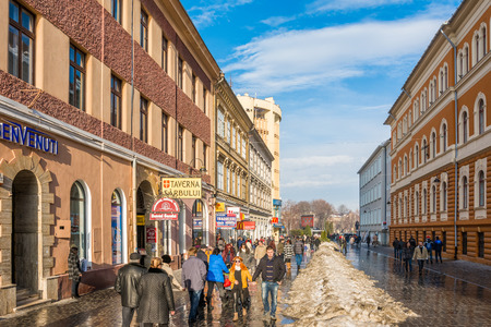 BRASOV, ROMANIA - FEBRUARY 09  Tourists Visiting Historical Old Center on February 09, 2014 in Brasov, Romania  Brasov Is One Of The Main Touristic Cities Of Romania In The Carpathian Mountains のeditorial素材
