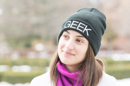 Happy Geek Girl Portrait With Winter Clothesの写真素材