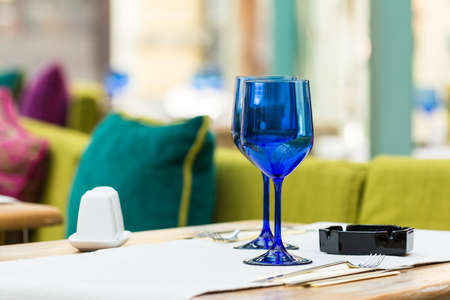 Elegant Empty Blue Glasses On Restaurant Tableのeditorial素材
