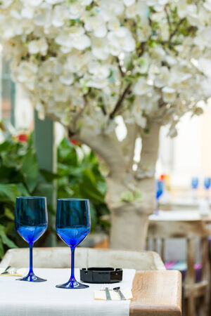 Elegant Empty Blue Glasses On Restaurant Tableのeditorial素材