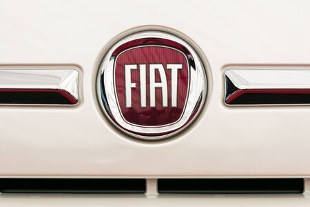 BUCHAREST, ROMANIA - APRIL 04, 2014  Fiat Sign Close Up  Founded in 1899 in Italy, in 2013 was the second largest European automaker by volumes produced, and the seventh in the world のeditorial素材