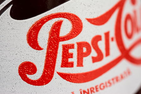 BUCHAREST, ROMANIA - MAY 12, 2014  330ml Pepsi Bottle Close Up  Pepsi is a carbonated soft drink...