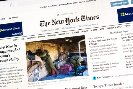 BUCHAREST, ROMANIA - JUNE 24, 2014  The New York Times Newspaper On Apple iPad Tablet  It is an American daily newspaper, founded and continuously published in New York City since 1851 のeditorial素材