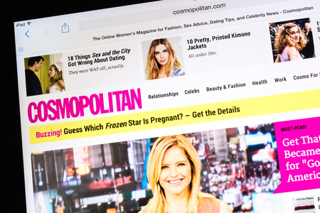 BUCHAREST, ROMANIA - JUNE 24, 2014  Cosmopolitan Magazine On Apple iPad Tablet  It was first...