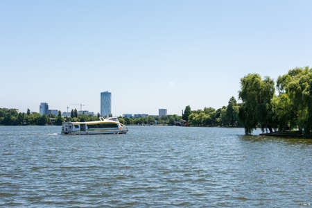 BUCHAREST, ROMANIA - JUNE 29, 2014  People Taking Boat Tour Ride On Herastrau Lake In Herastrau Public Park  Opened in 1939 is the largest park of Bucharest capital city のeditorial素材