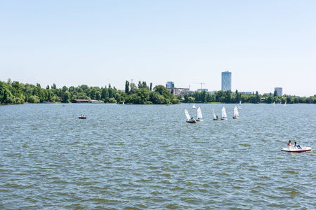 BUCHAREST, ROMANIA - JUNE 29, 2014  People Boat Ride On Herastrau Lake In Herastrau Public Park  Opened in 1939 is the largest park of Bucharest capital city のeditorial素材