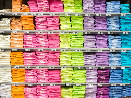 BUCHAREST, ROMANIA - JULY 09, 2014  Colorful Bath Towels On Supermarket Stand のeditorial素材