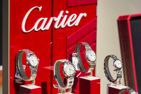 BUCHAREST, ROMANIA - JULY 10, 2014  Cartier Watches In Shop Window Display  Founded in Paris in 1847 it designs, manufactures, distributes and sells jewellery and watches のeditorial素材