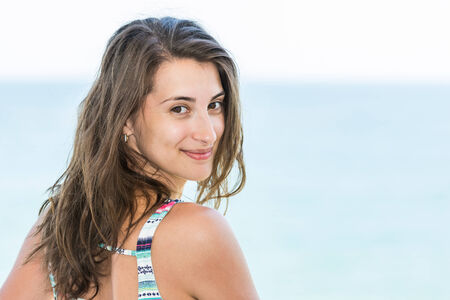Beautiful Happy Girl Portrait With Sea Background