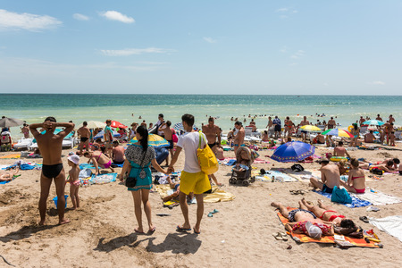 COSTINESTI, ROMANIA - JULY 29, 2014: People Enjoying Hot Weather On Costinesti Resort At The Black Sea Beach.のeditorial素材
