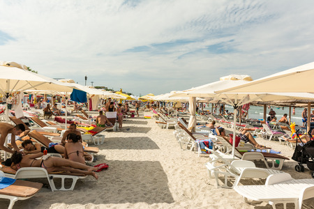 MAMAIA, ROMANIA - JULY 29, 2014: People Having Fun On Mamaia Beach At The Black Sea.のeditorial素材