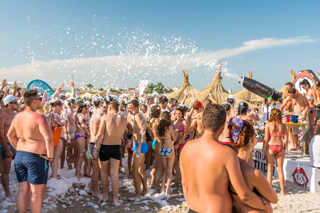 COSTINESTI, ROMANIA - AUGUST 15, 2014: Beach Foam Party On Costinesti Beach At The Black Sea.のeditorial素材