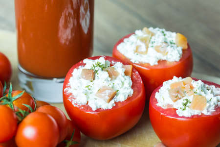 Fresh Red Tomatoes With Cheese And Tomato Juice Glassの写真素材