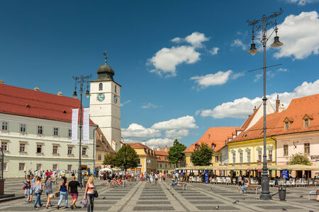 SIBIU, ROMANIA - AUGUST 18, 2014: The Main Square in the historical center was first mentioned in 1408 and is the largest public square which held public meetings, markets and public executions.のeditorial素材
