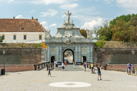 ALBA IULIA, ROMANIA - AUGUST 20, 2014: The Third Gate Of Carolina White Fortress Built In 1738 Is The Largest Gate Of The Fortification.のeditorial素材