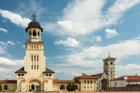 ALBA IULIA, ROMANIA - AUGUST 20, 2014: The Coronation Orthodox Cathedral and Saint Michael Roman Catholic Cathedral are located in Carolina White Fortress Of Alba Iulia.のeditorial素材