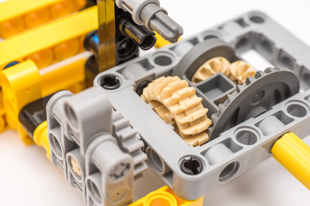 BUCHAREST, ROMANIA - DECEMBER 15, 2014: Lego Technic Engine Closeup. Technic is a line of Lego interconnecting plastic rods and parts that creates advanced models with complex movable arms.のeditorial素材