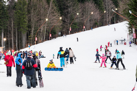PREDEAL, ROMANIA - DECEMBER 23, 2014:  People Having Fun Skiing On Snowy Mountain Sky Resort In Predeal.のeditorial素材